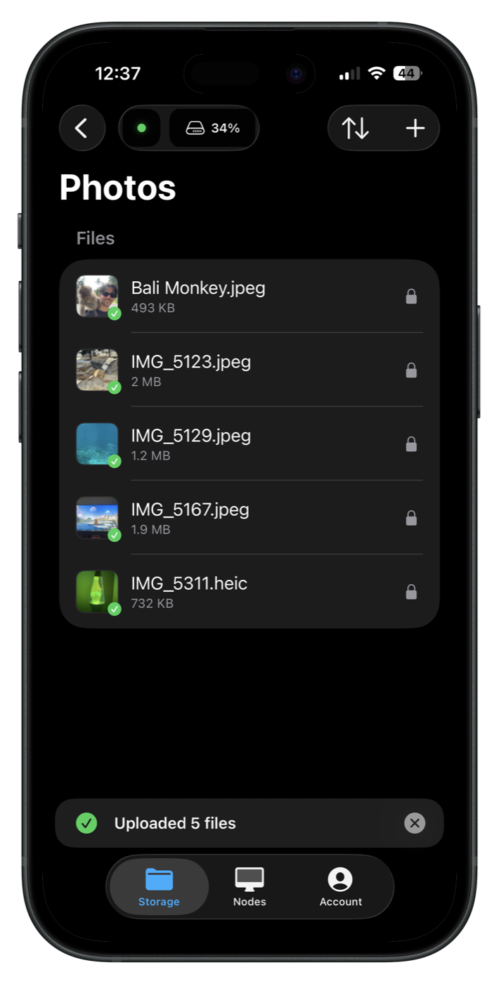 The same Photos folder in the Uncloud iPhone app, just after uploading five files