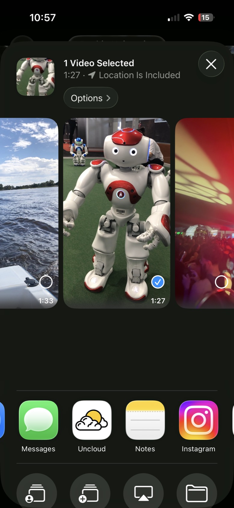 The share sheet for one selected video, with Uncloud in the row of apps